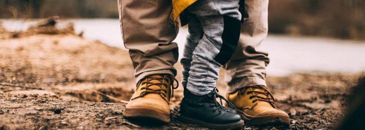 man and child's legs