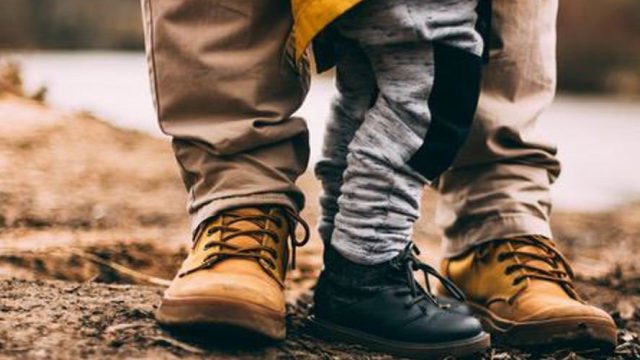 man and child's legs