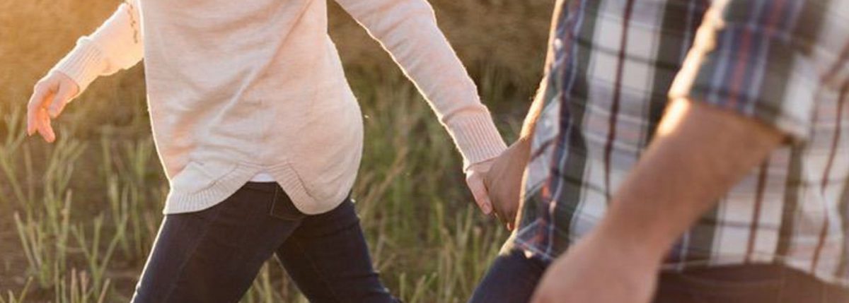 husband and wife hand in hand